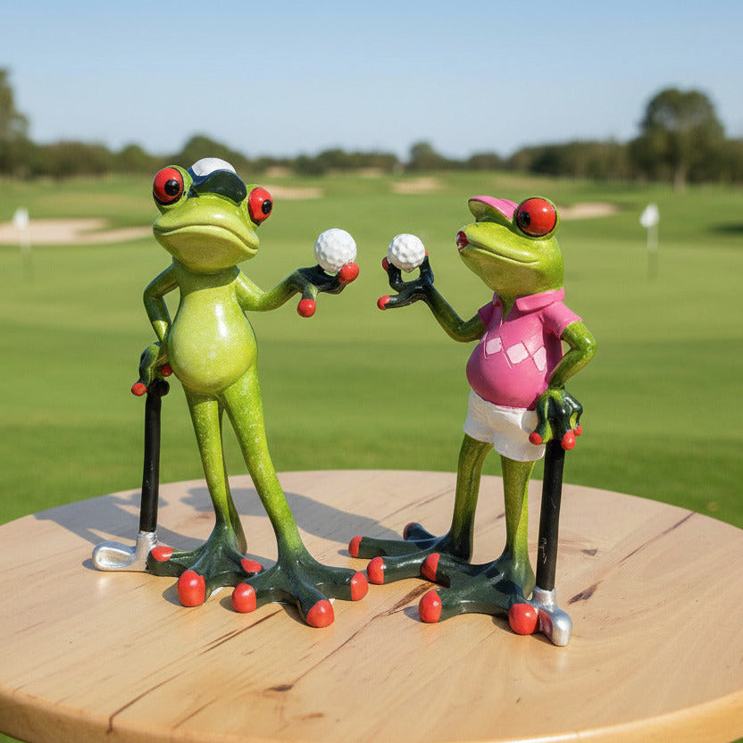 Frösche Golf spielend